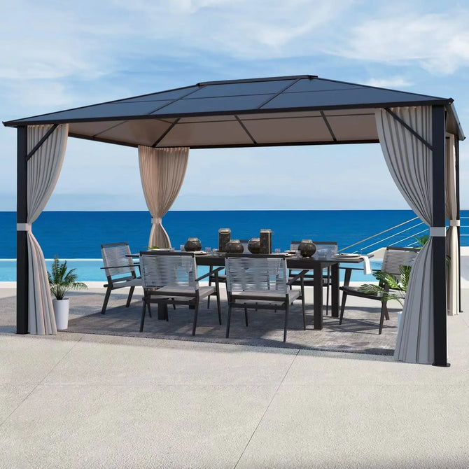 Erommy hardtop patio gazebo with curtains, outdoor dining table and chairs, and a scenic ocean view from a sunny terrace