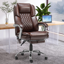 Brown leather office chair in an office setting with a desk and laptop.
